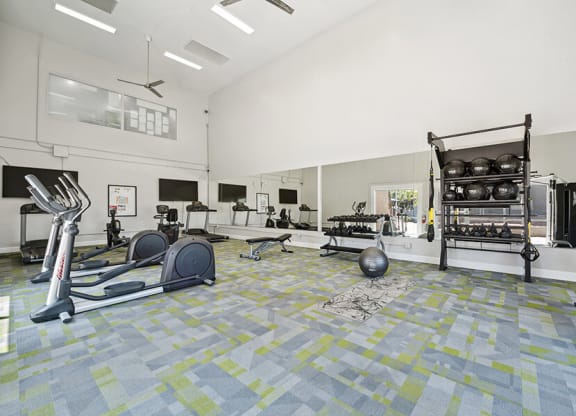 Community Fitness Center with Equipment at Country Club Verandas Apartments located in Mesa, AZ.