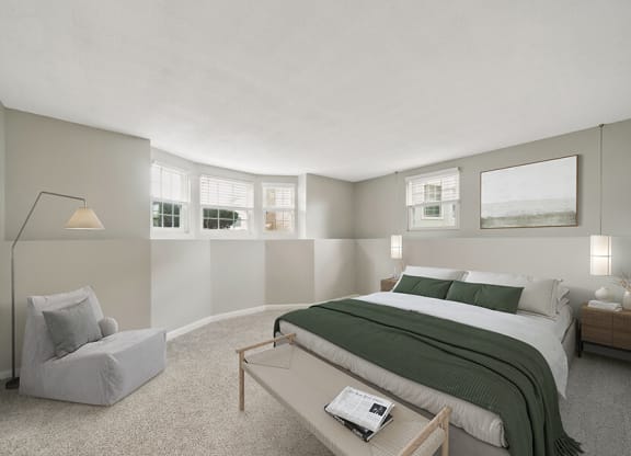 Model Bedroom with Carpet and Window Views at Meadows at Marlborough Apartments located in Marlborough, MA.