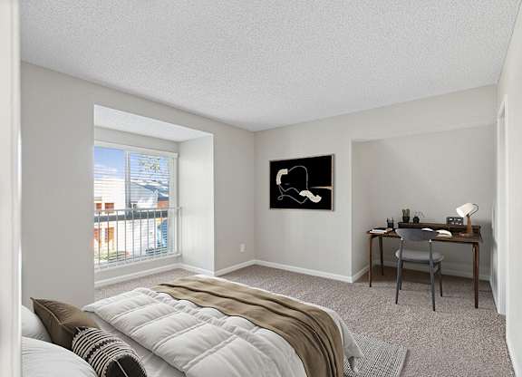 Model Bedroom with Carpet and Window View at Horizon Apartments located in Santa Ana, CA.