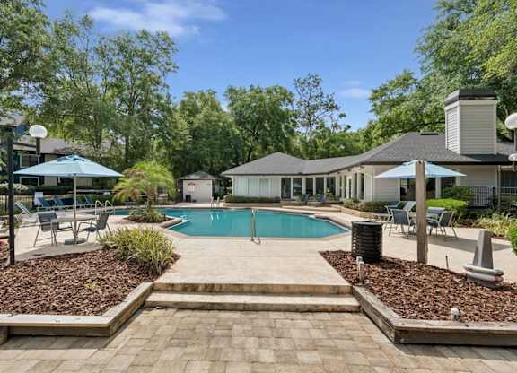 Swimming pool and sundeck at Northlake Apartments in Jacksonville, FL