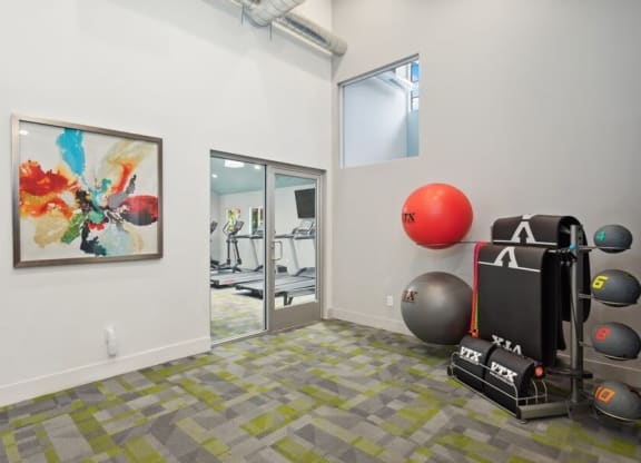 Community Fitness Center with Equipment at Creek 2645 Apartments in Sacramento, CA.