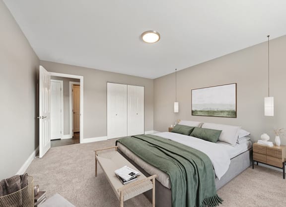 Model Bedroom with Carpet and Closet  at Heights at Marlborough Apartments located in Marlborough, MA.