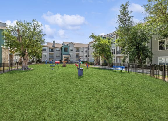 Community Dog Park with Agility Equipment at Essence Apartments in Dallas, TX.