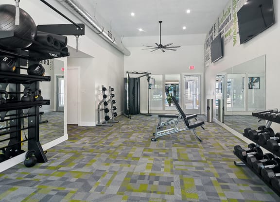 Community Fitness Center with Equipment at Overlook Apartments located in Salt Lake City, UT.