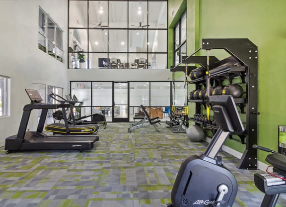 Community Fitness Center with Equipment at Meadow Ridge Apartments located in Las Vegas, NV.