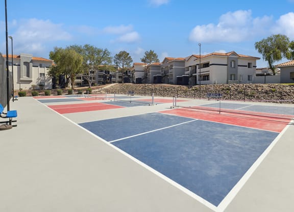 Community Pickleball Courts with Nets at Hilands Apartments in Tucson, AZ.