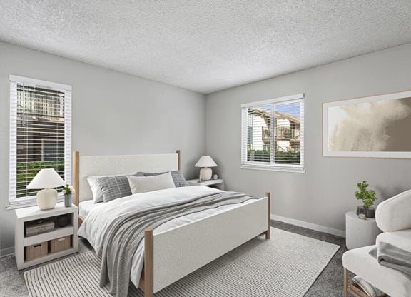 Model Bedroom with Carpet and Window Views at The Archer Apartments in Sacramento, CA.
