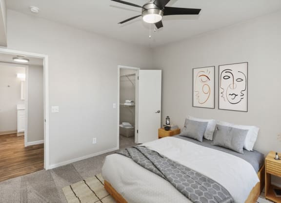 Model bedroom with walk-in closet