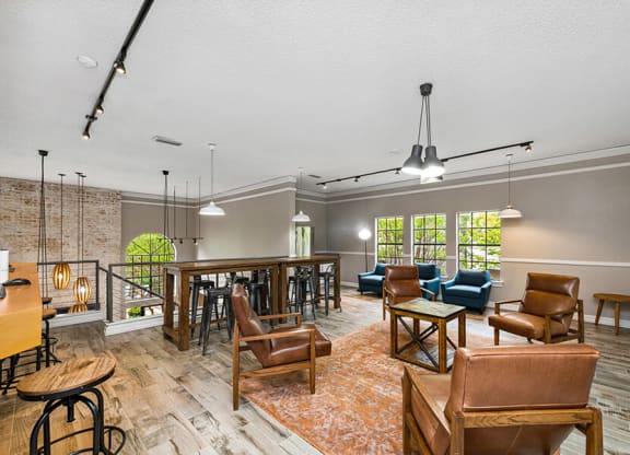 Community Clubhouse Upstairs Area with Lounge Furniture at Dallas North Park Apartments in Dallas, TX.