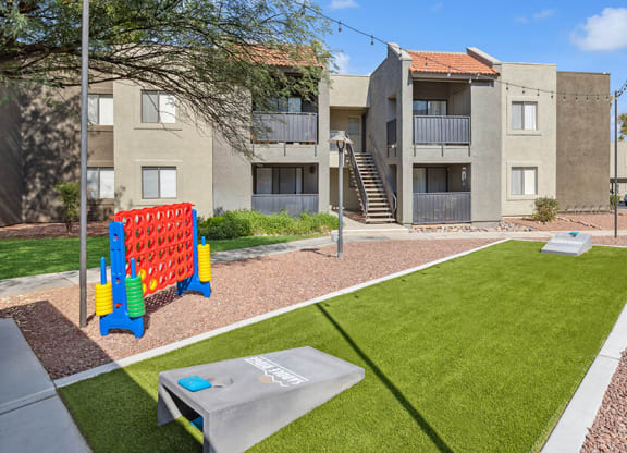 Outdoor Corn Hole Area at Saddle Ridge Apartments in Tucson, AZ.