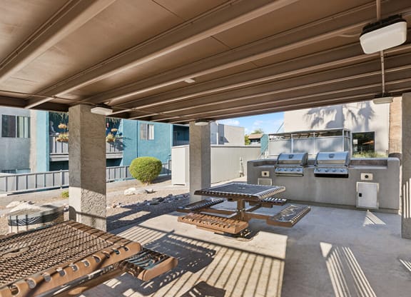 Outdoor BBQ Area with Canopy at Tanque Verde Apartments located in Tucson, AZ.
