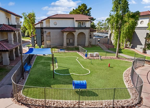 Community Dog Park with Agility Equipment at Stillwater Apartments in Glendale, AZ.
