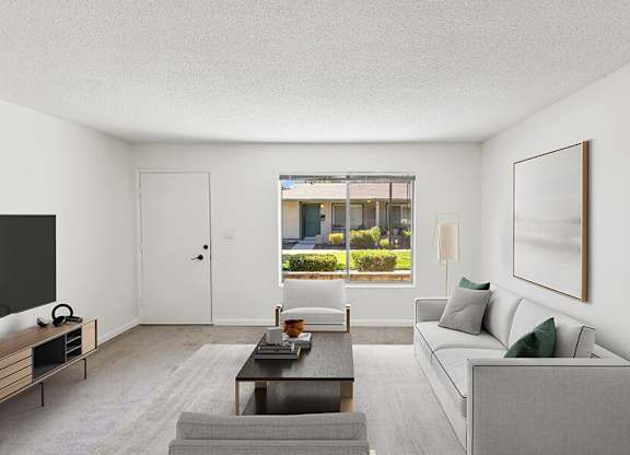 Model Living Room with Carpet at Walnut Creek Apartments located in Walnut Creek, CA.