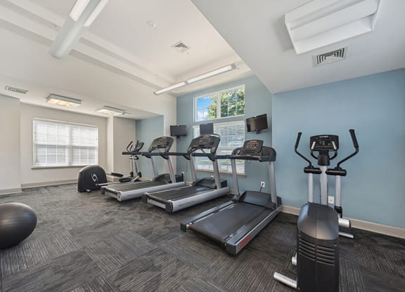 Community Fitness Center with Treadmills at The Commons at Haynes Farm Apartments in Boston, MA.