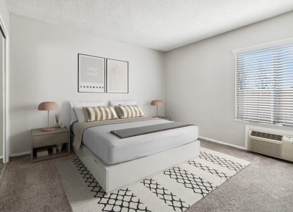 Model Bedroom 2 with Carpet & Window View at Forest Park Apartments in El Cajon, CA.