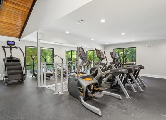 Community Fitness Center with Equipment at Dunwoody Village Apartments in Atlanta, GA.