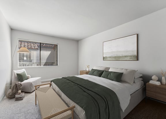 Model Bedroom with Carpet and Window View at Creek at 2645 Apartments located in Sacramento, CA.