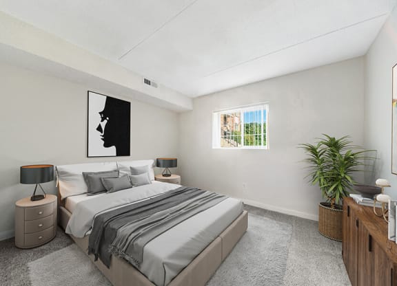 Model Bedroom with Carpet and Window View at Heights Marlborough Apartments in Boston, MA.