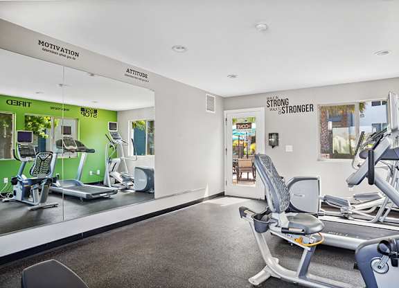 Community Fitness Center with Equipment at Cove La Mesa Apartments located in La Mesa, CA.