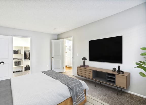 Model bedroom with walk-in closet