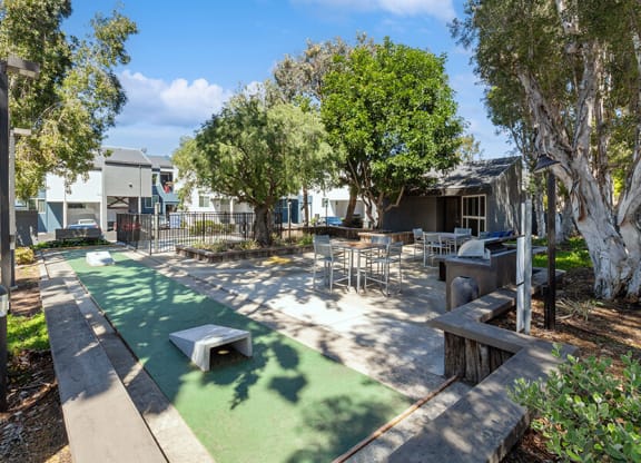 Outdoor Corn Hole Area at Colonnade at Fletcher Hills Apartments in El Cajon, CA.