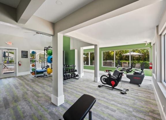 Community Fitness Center with Equipment at Waverley Place Apartments in Naples, FL.