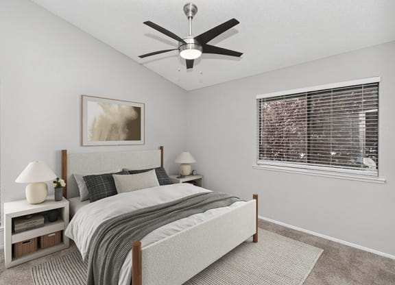 Model Bedroom with Carpet and Window Views at The Meritage Apartments in Vallejo, CA.