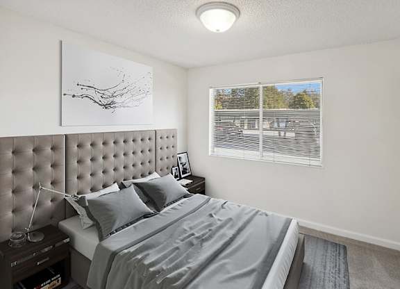 Model Bedroom with Carpet and Closet at Walnut Creek Apartments located in Walnut Creek, CA.