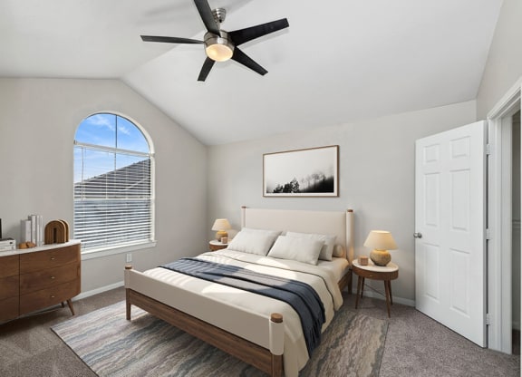 Model Bedroom with Carpet and Walk In Closet at Hidden Creek Apartments in Lewisville, TX.