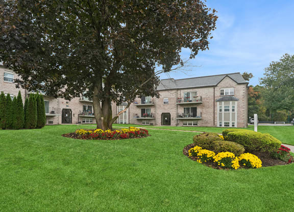Exterior Community Building and Landscape at Meadows at Marlborough Apartments located in Marlborough, MA.
