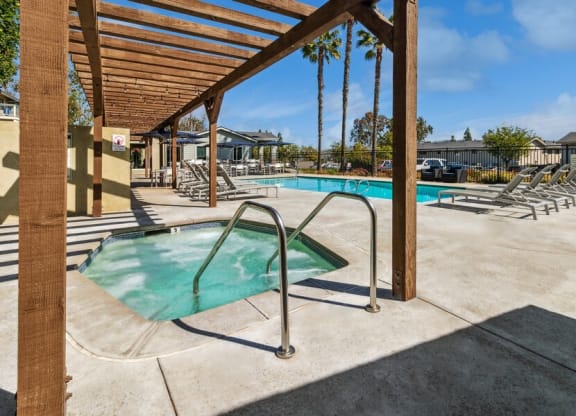 Community Hot Tub and view of Pool at Forest Park Apartments in El Cajon, CA.