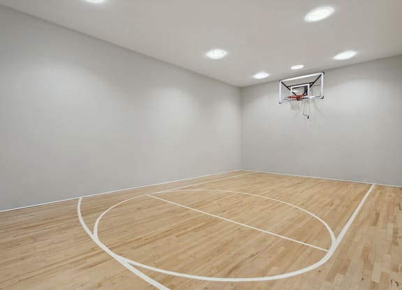 Indoor Basketball Court at Fountains at Point West Apartments in Sacramento, CA.