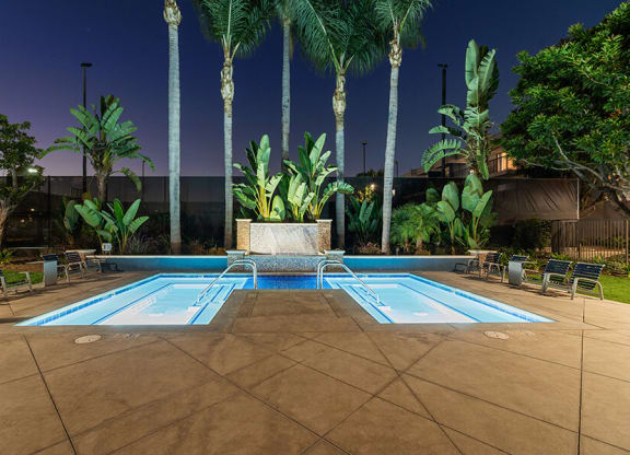 Community Hot Tubs and Lounge Furniture at Madison Park Apartments located in Anaheim, CA.