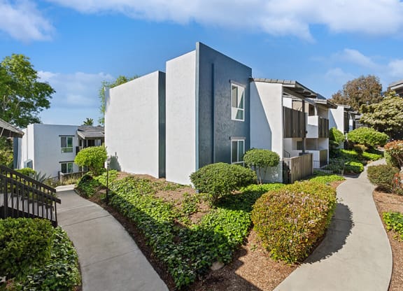 Exterior Community Building and Landscape at Colonnade at Fletcher Hills Apartments in El Cajon, CA.