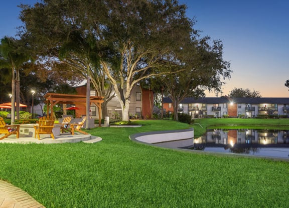 Community Pond and Walking Path at Bridges at Bayside Apartments in St. Petersburg, FL.