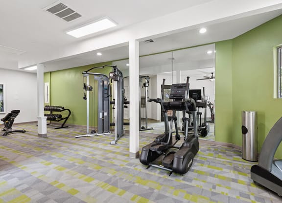 Community Fitness Center with Equipment at Crystal Creek Apartments in Phoenix, AZ.