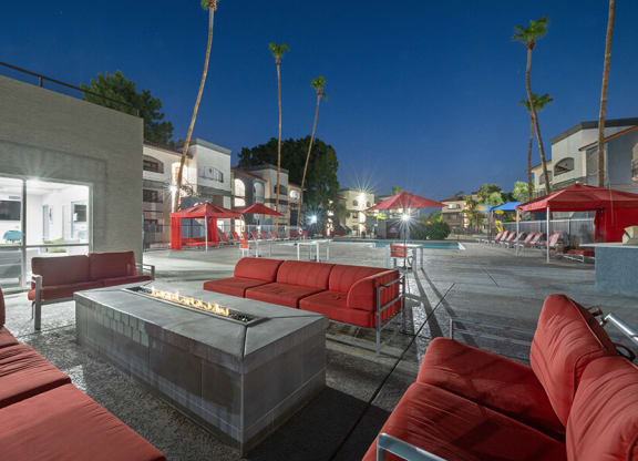Outdoor Fire Pit Area with Lounge Furniture at Country Club Verandas Apartments located in Mesa, AZ.