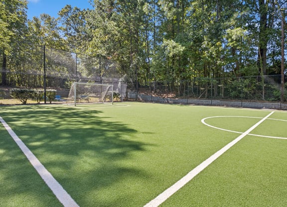 Community Soccer Field with Nets at Arbor Village Apartments located in Charlotte, NC.
