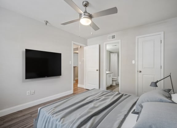 Model bedroom with queen-size bed