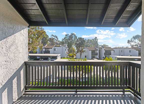 Model Exterior Patio at Santa Fe Ranch Apartments located in Carlsbad, CA.