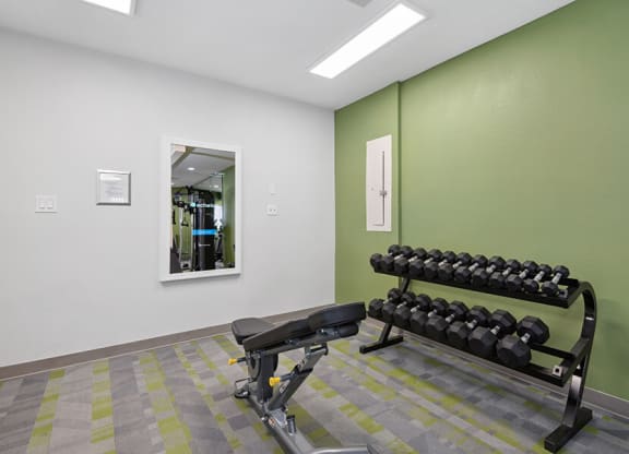 Community Fitness Center with Equipment at Crystal Creek Apartments in Phoenix, AZ.