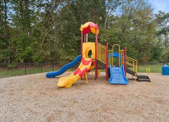 Community Playground with Two Slides at Meadows at Marlborough Apartments located in Marlborough, MA.at Meadows at Marlborough Apartments located in Marlborough, MA.