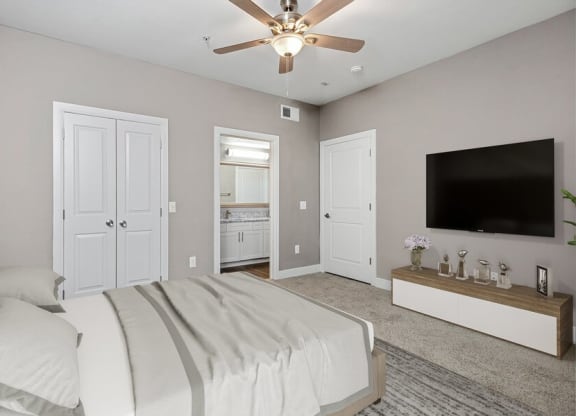 Model bedroom with bathroom