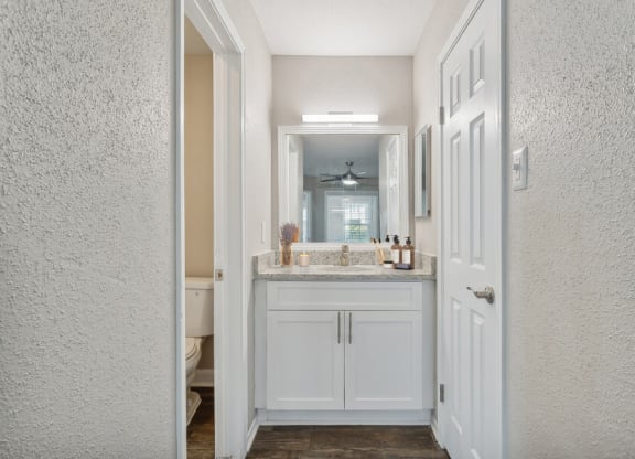 a view of a bathroom with a white door