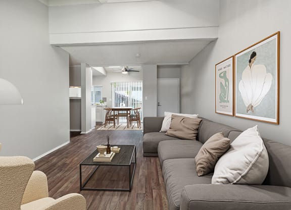 Model Living Room with Wood-Style Flooring at Colonnade at Fletcher Hills Apartments in El Cajon, CA.