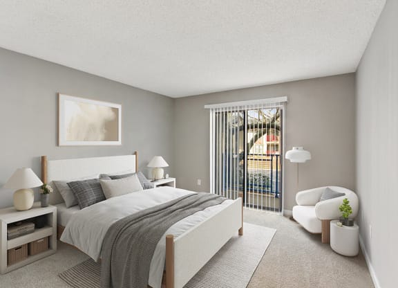 Model Bedroom with Carpet and Window View at Grandstand Apartments in Marietta, GA.