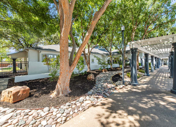 Exterior Community Building and Landscape at Allure North Dallas Apartments in Dallas, TX.