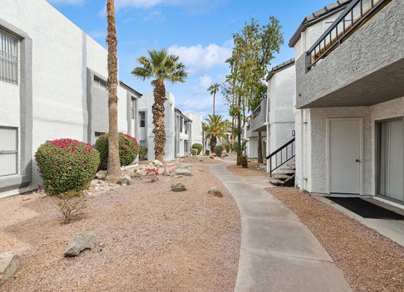 Exterior Community Building and Landscape at Crystal Creek Apartments in Phoenix, AZ.