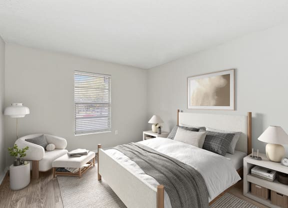 Model Bedroom with Carpet and Window View at Seven Lakes at Carrollwood Apartments in Tampa, FL.