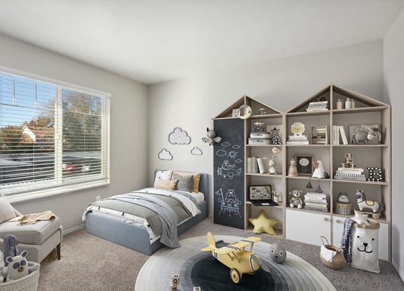 Model Bedroom with Carpet and Window View at Broadmoor Village Apartments in Salt Lake City, UT.